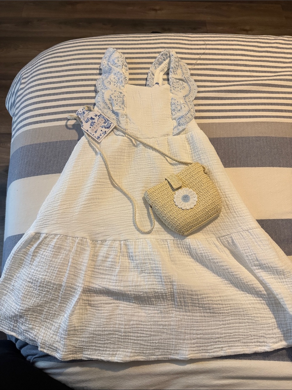 btween White Cotton Dress with Blue Eyelet Straps and Straw Daisy Bag